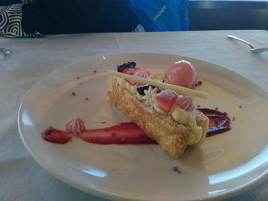 Seven Glaciers Restaurant signature dishes The menu is a prix-fixe chef's tasting menu that changes to reflect seasonal availability, featuring local seafood and wild game. Baked Alyeska is a notable dessert.